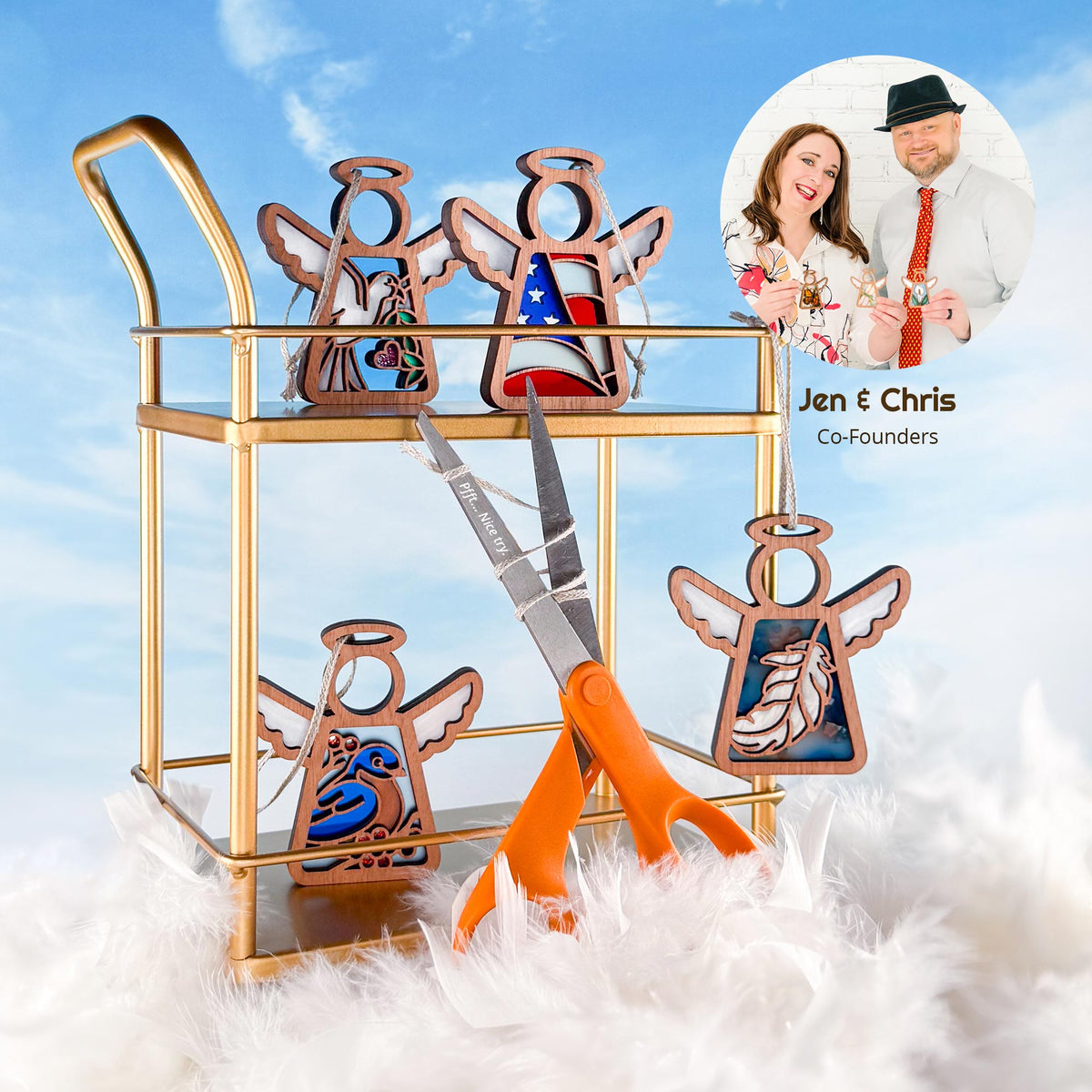 Decorative stand with angel ornaments and a pair of scissors against a blue sky background. Picture of the Forged Flare® owners. Text reads: Jen & Chris, Co-Founders.