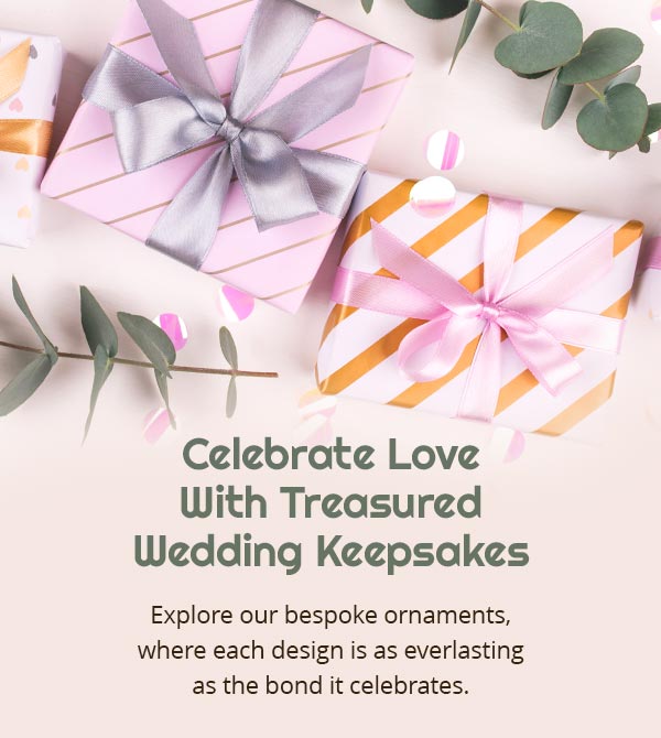 Celebrate Love With Treasured Wedding Keepsakes. Explore our bespoke ornaments, where each design is as everlasting as the bond it celebrates. Elegantly wrapped wedding gifts sitting on a peach table. Perfect for those searching for wedding gift ideas for couples or unique newlywed gifts.
