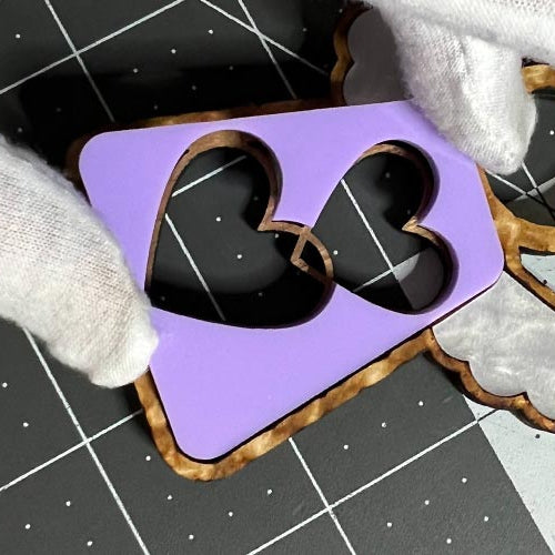 Heart-shaped interior fill of a Mother's Angels ornament.