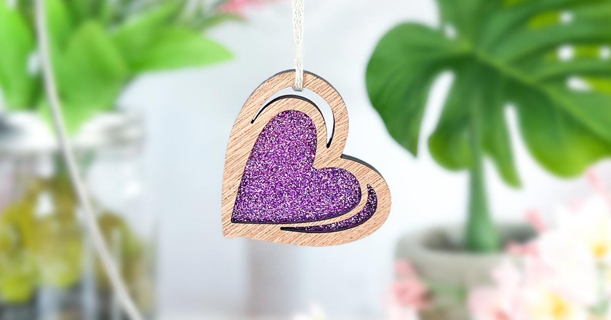Unique wooden heart ornament, perfect as a Mother's Day gift or one-of-a-kind gifts for mom, representing unique gift ideas for women by Forged Flare®.