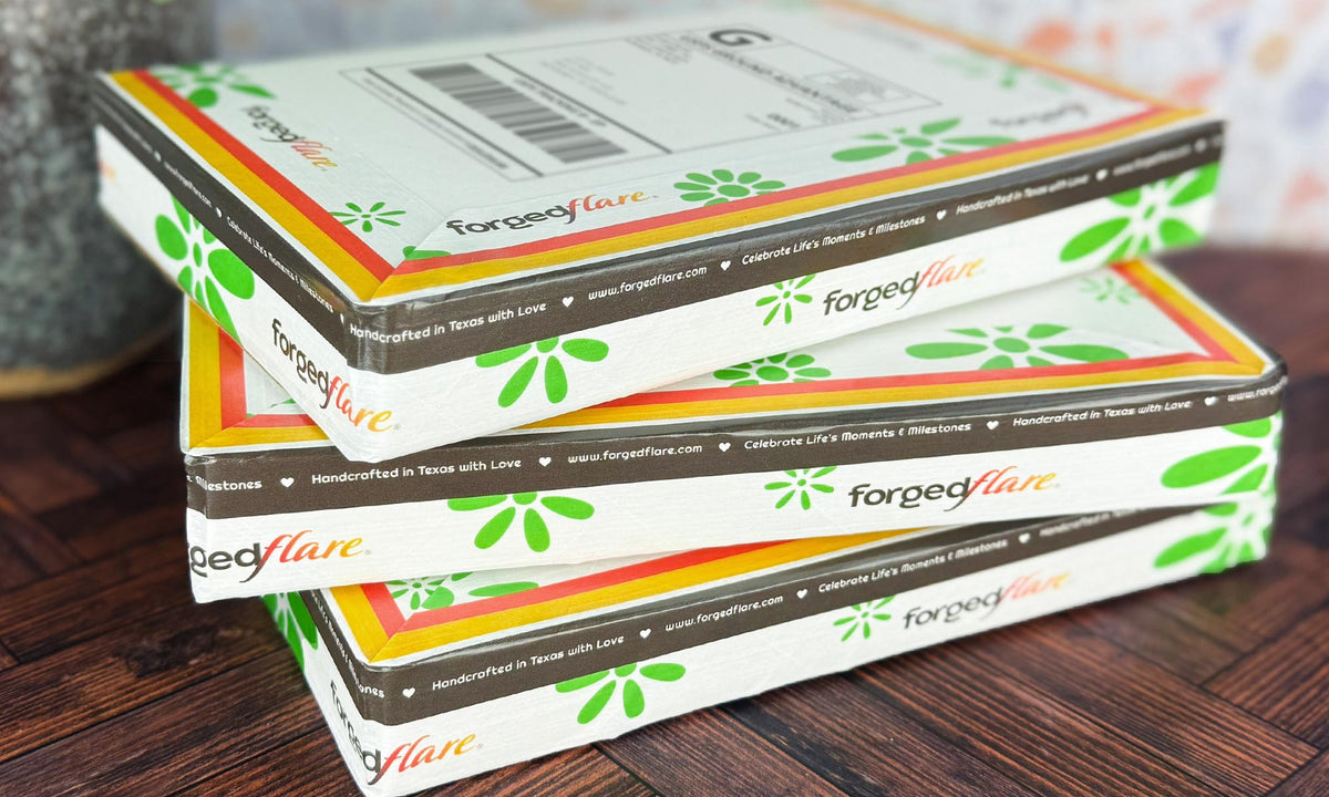 Stack of 'Forged Flare' boxes on a wooden surface