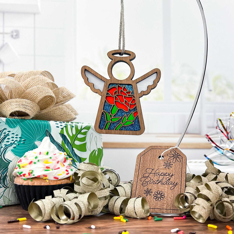 Close-up of a red carnation flower angel ornament, ideal as a unique birthday present for her and a representation of January birth flowers.