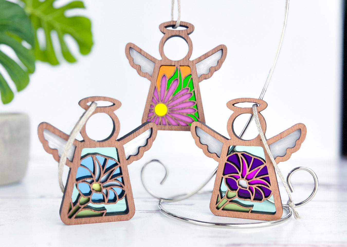 Angel ornaments featuring September birth month flowers, ideal birthday gift ideas for a wife, best friend or special women, showcasing vibrant aster and morning glory birth flowers in a stained glass inspired style.