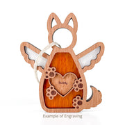 The Forever By My Side Dog Angel Ornament by Forged Flare® is a wooden dog-shaped ornament with angel wings, a hanging rope, and a heart engraved with "Buddy." A unique gift for dog lovers—features engraving example below. Text reads "Example of Engraving".