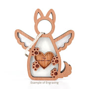 The Forever By My Side Dog Angel Ornament by Forged Flare® features wood shaped like an angel with wings, pointed ears, tail, paw prints, a heart engraved "Max Forever Loved," and a string—an ideal gift for dog lovers. Example of engraving shown. Text reads "Example of Engraving".