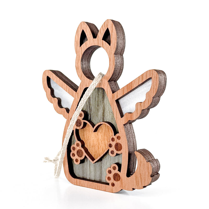 The Forged Flare® Forever By My Side Dog Angel Ornament features a winged dog design with a heart and paw prints, layered wood detailing, and a hanging loop—an ideal personalized gift or ornament for dog lovers.