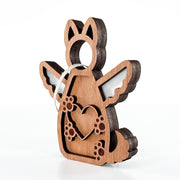 The Forged Flare® Forever By My Side Dog Angel Ornament features a layered, laser-cut wooden dog with heart and paw cutouts, complete with twine for hanging—perfect as a memorial or gift for dog lovers.