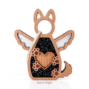 The Forged Flare® Forever By My Side Dog Angel Ornament is a wooden decoration shaped like a winged dog with paw prints, a heart, black starry night design, and includes string for hanging; perfect for dog lovers. Text reads "Starry Night".