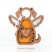The Forged Flare® Forever In My Heart Dog Angel Ornament features a dog with wings, paw prints, a heart engraved "Sadie Always Loved," and a hanging string. A touching dog lover gift. Text reads "Example of Engraving".