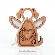 The Forged Flare® Forever In My Heart Dog Angel Ornament features a wooden dog with angel wings, heart, and flower cutouts. Engraved with "Bailey Forever Good." Includes hanging string; Text reads "Example of Engraving".