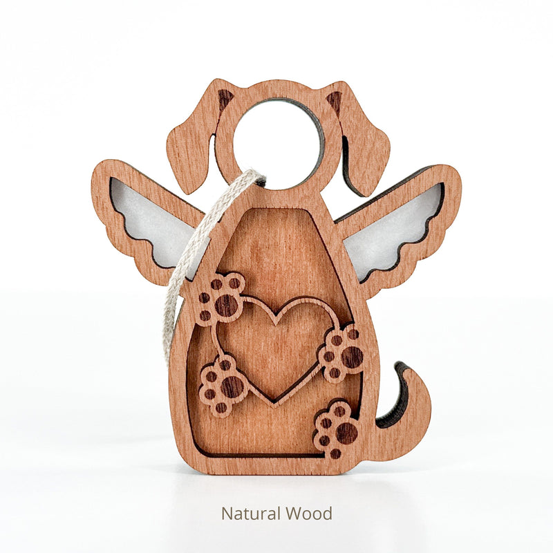The Forever In My Heart Dog Angel Ornament by Forged Flare® is a natural wood ornament with angel wings, heart, and paw prints—perfect as a dog memorial or gift for dog lovers. Includes hanging string. "Text reads "Natural Wood".