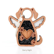 The Forged Flare® Forever In My Heart Dog Angel Ornament features a dog shape with angel wings, paw prints, a heart cutout, sparkly black background, and a hanging string. Ideal as a memorial or dog lover gift. Text reads "Starry Night".