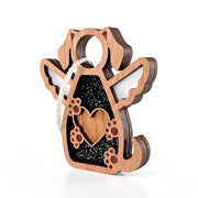 The Forever In My Heart Dog Angel Ornament by Forged Flare® features dog ears, wings, paw prints, a heart cut-out, and glittery black background—perfect as a personalized dog lover or dog mom gift for any occasion.