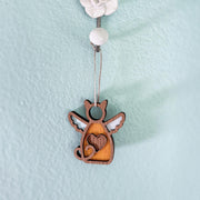 The Forged Flare® Forever Loved Cat Angel Ornament for Charity features a wooden cat with white wings and a heart cutout, hanging on a silver string—perfect as a heartfelt cat memorial or personalized pet ornament.