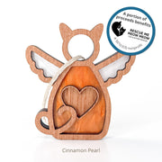 The Forged Flare® Forever Loved Cat Angel Ornament for Charity is a wooden cat-shaped piece with angel wings and heart cutout. Each purchase helps Rescue Me Meow Meow, a nonprofit supporting cats and kittens in need.