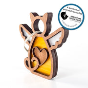 The Forged Flare® Forever Loved Cat Angel Ornament features a yellow body, cat ears, wings, and a heart. Sticker text reads "A portion of proceeds benefits Rescue Me Meow Meow Cat and Kitten Rescue. A 501c3 nonprofit".