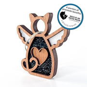 The Forged Flare® Forever Loved Cat Angel Ornament features a winged cat with heart cutout. A portion of proceeds supports Rescue Me Meow Meow, a cat rescue. Ideal as a personalized keepsake or memorial gift for any cat lover.