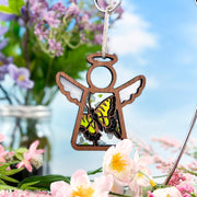 The Forged Flare® Mother's Angels® 3.5" Swallowtail Butterfly Ornament features a wooden angel with a yellow and black butterfly motif—ideal for brightening any space and available as a Warehouse Return on Amazon.