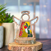 The Forged Flare® Warehouse Return - Ruby-Throated Hummingbird Ornament is a 3.5" Mother's Angels® handcrafted angel figurine with stained glass wings, offered on Amazon Marketplace.