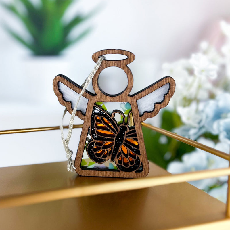 The Forged Flare® Monarch Butterfly Ornament with Imperfections is a 3.5" Mother's Angels® figurine featuring white wings and a vivid butterfly design—a meaningful memorial gift.