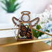 A Mother’s Angels® ornament by Forged Flare® with a Monarch butterfly at its center, beautifully suited as butterfly decorations hanging in a home, and a thoughtful housewarming gift that adds a touch of warmth and color.