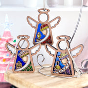 The Forged Flare® Christmas Nativity 3-Piece Bundle features three 3.5" Mother's Angels® angel figurines symbolizing the Wise Men’s gifts, with colorful robes and stained-glass wings—perfect for festive holiday decor.