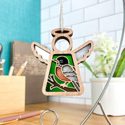 The Forged Flare® American Robin Ornament is a 3.5"H Mother's Angels® angel figurine with a robin cutout—ideal for bird lovers or as a unique bird watching gift.