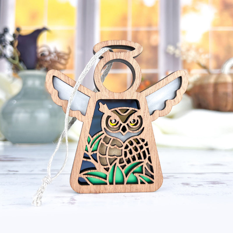 The Forged Flare® Owl Ornament | 3.5" (H) Angel Figurine from the Mother's Angels® collection features cutout owl and green foliage details—a perfect bird lover gift for any occasion.