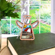 The Forged Flare® Summer Beach Ornament, a 3.5"H Mother's Angels® figurine, features stained glass-style angel wings with waves, sun, and starfish—perfect beach house decor or Christmas tree accent.