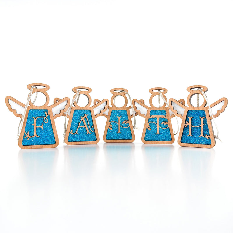 Set of five angel-shaped decorative ornaments that spell out FAITH on a white background