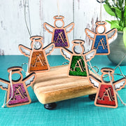 Vibrant handcrafted initial A ornament set in glittery purple, green, orange, blue, pink and red, designed as monogram A ornaments for personalized Christmas ornaments.