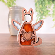 The Forged Flare® Forever By My Side Dog Angel Ornament is an adorable wooden piece with a heart and flower design—perfect for pairing with cat ornaments as a thoughtful gift for any dog lover.