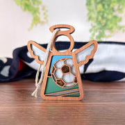 The Forged Flare® Mother's Angels® Soccer Ornament is a 3.5" wooden angel figurine with a soccer ball design and hanging string—perfect as a teacher Christmas gift.