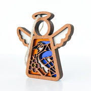 The Forged Flare® Mother's Angels® Blue Jay Ornament is a 3.5" wooden angel figurine with white wings, blue jay and pink flower details, and a string halo for hanging—an ideal bird lover or memorial gift for any occasion.