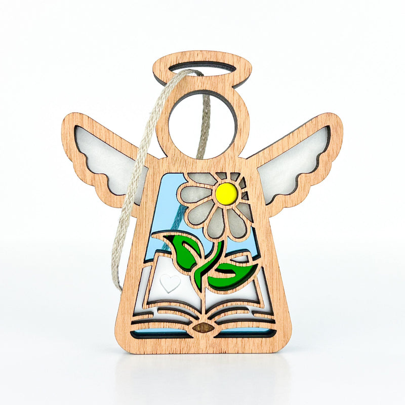 The Forged Flare® Book Lovers Ornament is a 3.5" Mother's Angels® figurine with outstretched wings, cutout flower, and blue-white accents—an ideal author or book club gift for literary fans.