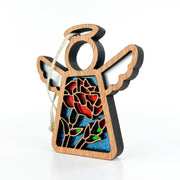 The Forged Flare® Carnation Ornament is a 3.5" Mother's Angels® angel figurine featuring cut-out wings, a stained glass-style carnation and green leaf design on blue, with a hanging string attached to one wing.