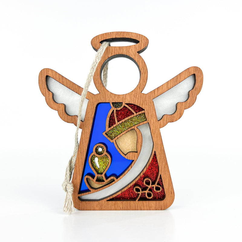 The Forged Flare® Mother's Angels® 3.5" Christmas Nativity Red Wise Man angel figurine features stained-glass accents in blue, red, and gold—perfect as a beautiful Nativity gift or Christmas tree ornament with a looped white string for hanging.