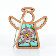 The Forged Flare® Columbine Ornament is a 3.5" wooden Mother's Angels® figurine with cut-out wings, halo, and beige string loop—perfect as a colorful Christmas tree ornament for angel lovers.