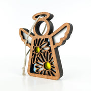 The Forged Flare® Mother's Angels® Warehouse Return - Daisy Ornament is a 3.5" wooden angel figurine with white wings, floral cut-outs, and a hanging string, perfect for collectors or Amazon warehouse return resellers.