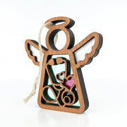 The Forged Flare® Mother's Angels® 3.5" Doctor/Nurse Ornament has white wings, a stethoscope design, and a pink glitter heart. This collectible angel figurine features a hanging string—perfect as a medical-themed gift or centerpiece.