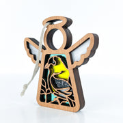 The Forged Flare® Goldfinch Ornament is a 3.5" tall wooden Mother's Angels® angel figurine with a hollow center, decorative bird and plant accents, colored details, and a hanging string—an ideal gift for bird lovers or bird watchers.