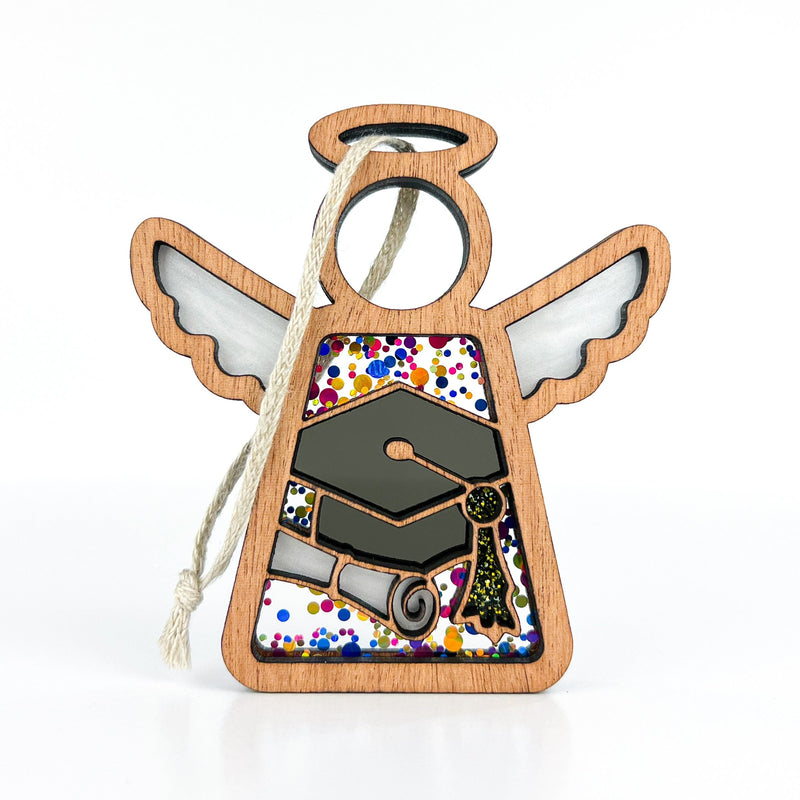 The Forged Flare® Mother's Angels® Graduation Ornament is a 3.5" angel figurine with cap, diploma, and key designs—colorfully dotted with a white hanging loop—perfect for graduation gifts or adding to your angel collection.