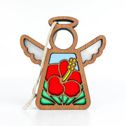 The Forged Flare® Hibiscus Ornament is a 3.5" Mother's Angels® wooden angel figurine with white wings, a halo, a cutout face, and a red hibiscus flower design—perfect as a Hawaiian-inspired Christmas ornament with hanging string.