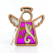 The Honeysuckle Ornament by Forged Flare® is a 3.5" Mother's Angels® figurine featuring a wooden angel with outspread wings, a halo, and honeysuckle flower motifs on purple. Includes a white hanging loop.