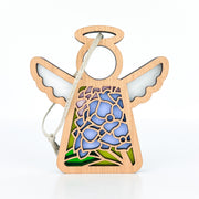 The 3.5" Hydrangea Ornament from Forged Flare® Mother's Angels® features a wooden angel with a hollow head, white wings, blue and green hydrangea stained-glass design, and a string loop for hanging as a unique Christmas ornament.