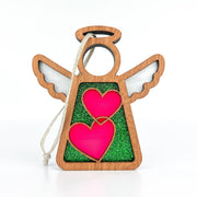 The Forged Flare® Limited Edition Interlocking Hearts Ornament - Series 8 is a 3.5" Mother's Angels® figurine featuring pink hearts, green glitter, white wings, and string for hanging—perfect for your Christmas tree. Displayed on a white background.