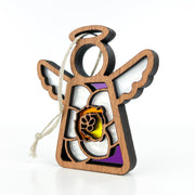 The Forged Flare® Jonquil Ornament is a 3.5" Mother's Angels® figurine featuring a wooden angel with white wings, halo, stained glass accents in purple/yellow, and a March jonquil paw print design. Includes attached string for hanging.