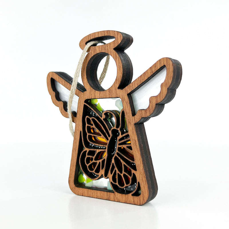 The Forged Flare® Mother's Angels® Monarch Butterfly Ornament is a 3.5" wooden angel figurine featuring outstretched wings, a black butterfly cutout, and a twine hanger—an ideal heartfelt memorial gift.