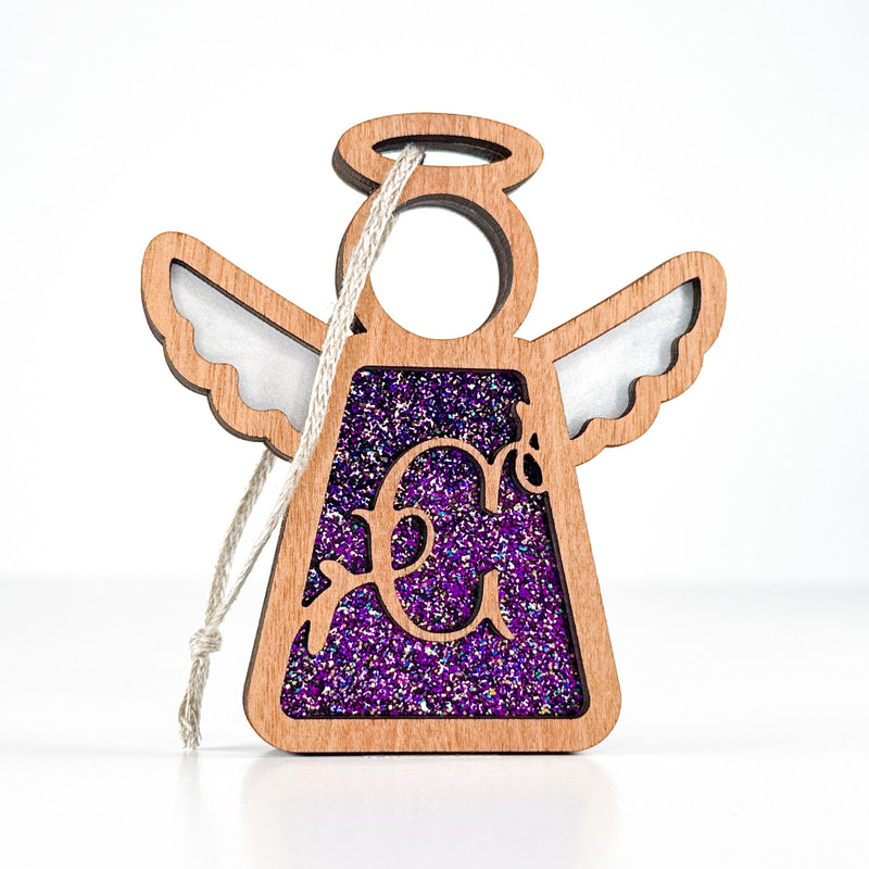 Front view of a personalized letter C angel ornament with purple glitter - a thoughtful monogram Christmas gift