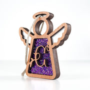Side view of a purple sparkle C monogram ornament, showcasing its handcrafted Texas artistry for special occasions